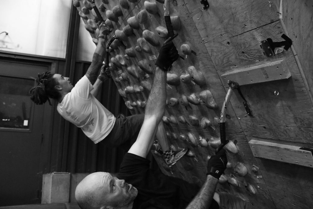 Exum Guide Garrick Hart and climber Ryan M. train sport-specific fitness during an ice climb pre-season training cycle. 