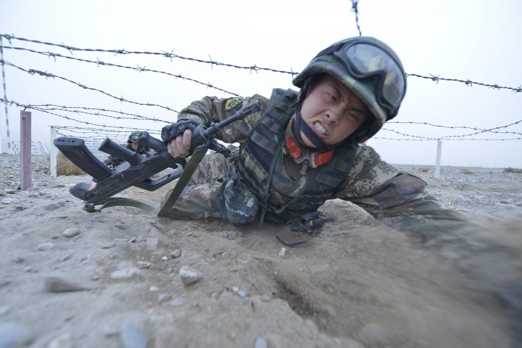 Soldiers from a special unit of the People's Armed Police in Xinjiang attend a training session in Kashgar, Xinjiang Uighur Autonomous Region, China, February 20, 2016. REUTERS/Stringer ATTENTION EDITORS - THIS PICTURE WAS PROVIDED BY A THIRD PARTY. THIS PICTURE IS DISTRIBUTED EXACTLY AS RECEIVED BY REUTERS, AS A SERVICE TO CLIENTS. CHINA OUT. NO COMMERCIAL OR EDITORIAL SALES IN CHINA. TPX IMAGES OF THE DAY - RTX27YUC